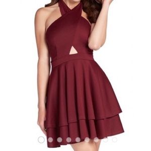 Kalani hilliker for Alyce Paris halter dress.